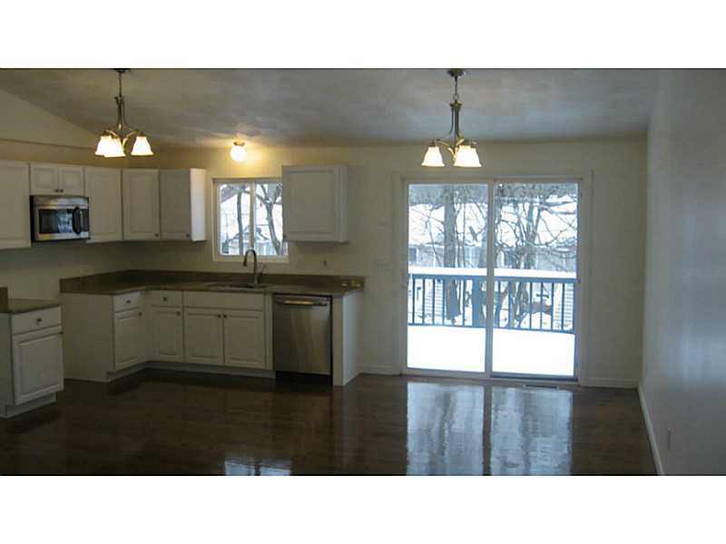 43 Benoit Street Coventry, RI 02816 - Photo 5 of 10 Kitchen. Gleaming hardwood floors.