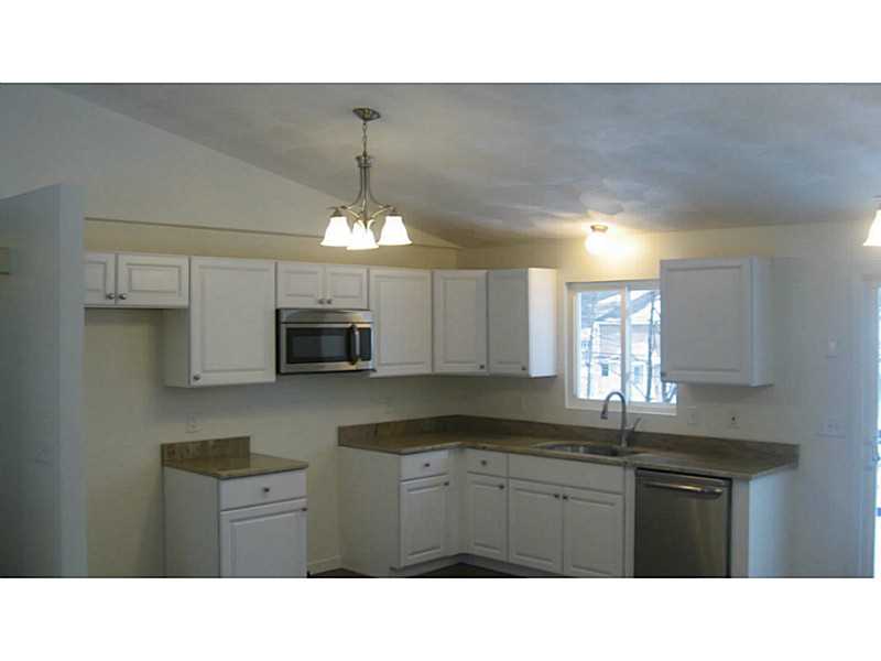 43 Benoit Street Coventry, RI 02816 - Photo 6 of 10 Kitchen. New kitchen with granite counters and stainless steel appliances.