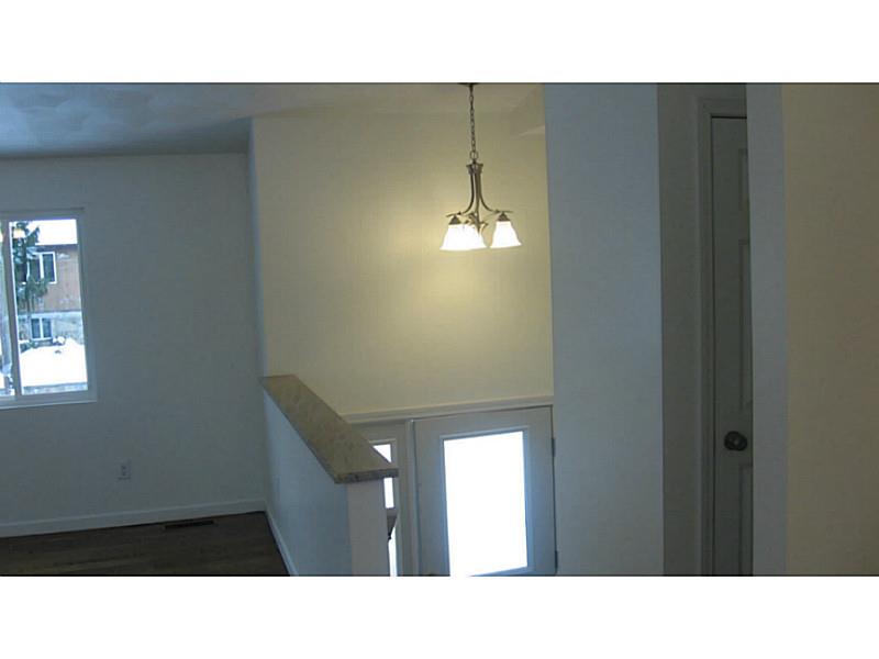 43 Benoit Street Coventry, RI 02816 - Photo 7 of 10 Living Room. Sunlit entrance foyer, with frosted glass entrance.
