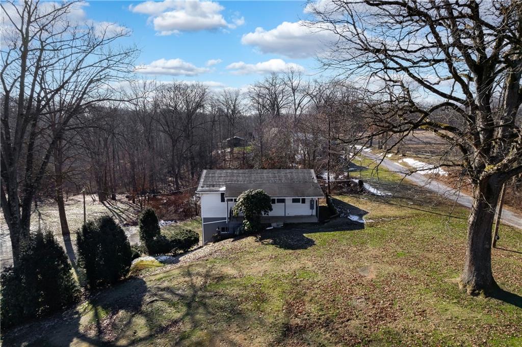 325 East Brewster Road Butler, PA 16001 - Photo 5 of 36 a view of swimming pool with a backyard