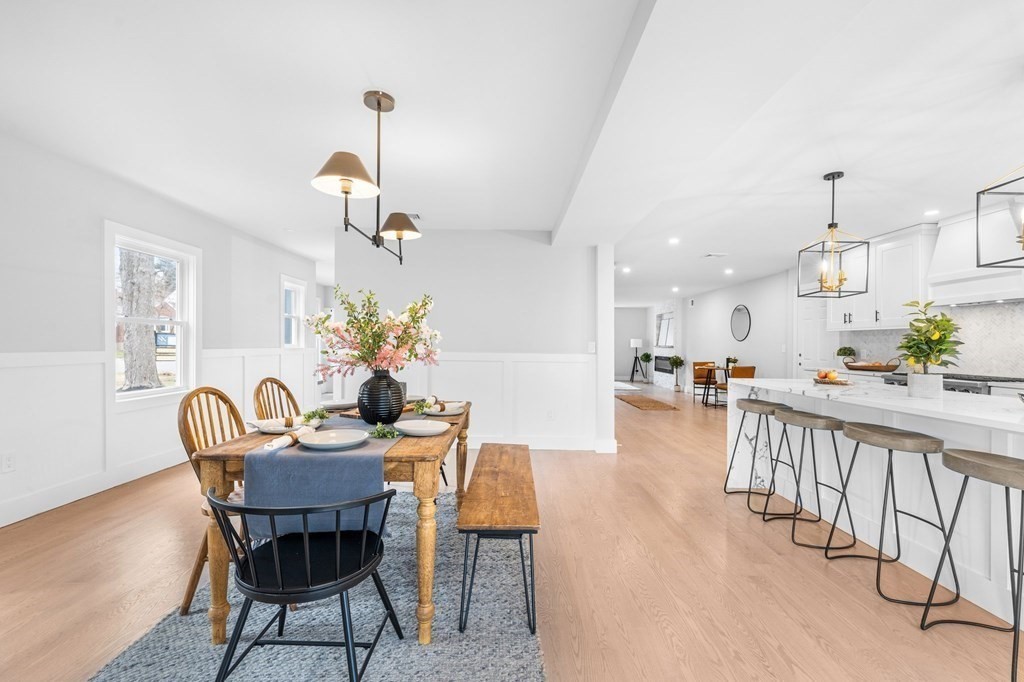20 Mohawk Road Burlington, MA 01803 - Photo 13 of 39 a view of a dining room with furniture wooden floor and a chandelier