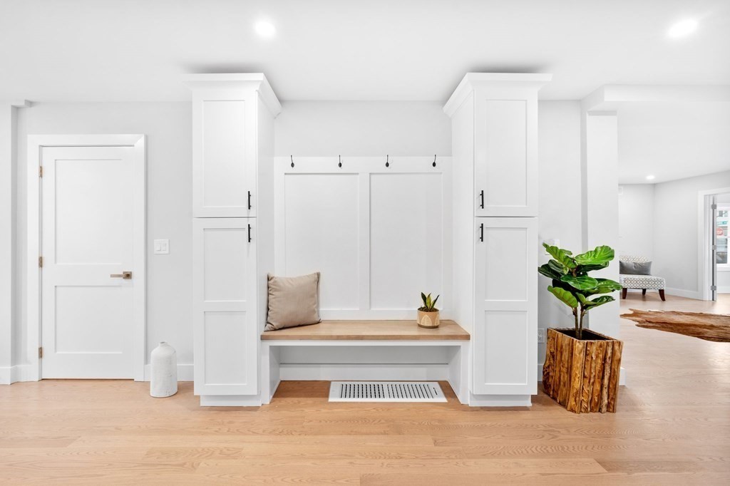 20 Mohawk Road Burlington, MA 01803 - Photo 14 of 39 a living room with furniture and a potted plant