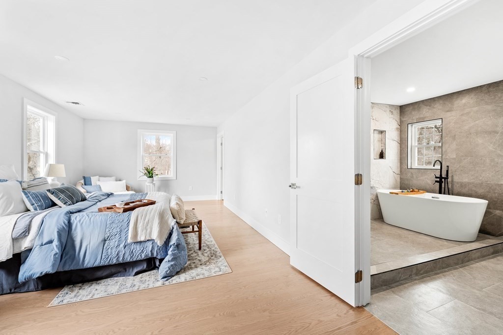 20 Mohawk Road Burlington, MA 01803 - Photo 22 of 39 a bed room with a bed and a couch