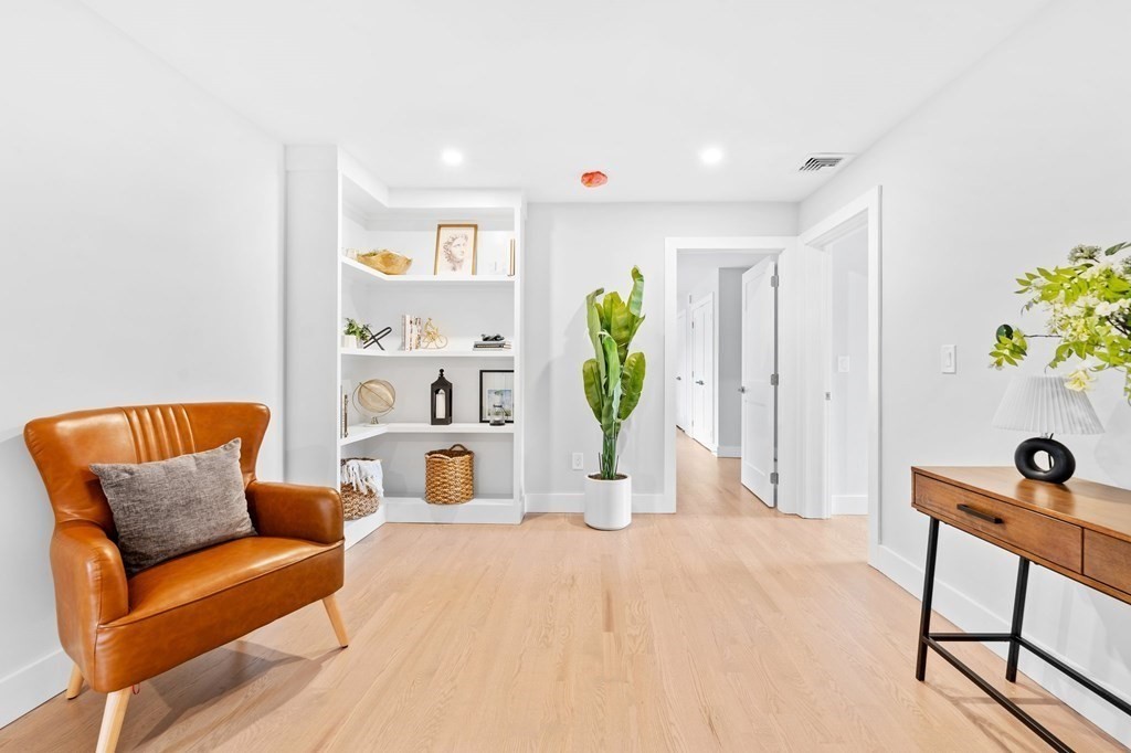 20 Mohawk Road Burlington, MA 01803 - Photo 25 of 39 a living room with furniture and a wooden floor