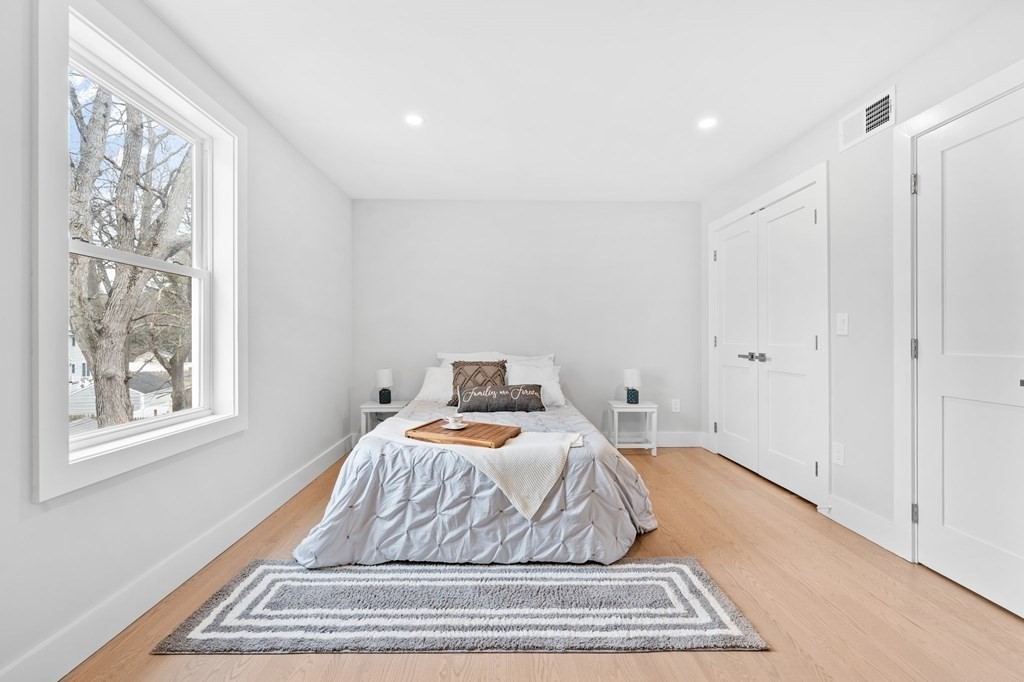 20 Mohawk Road Burlington, MA 01803 - Photo 26 of 39 a bedroom with a bed and a window
