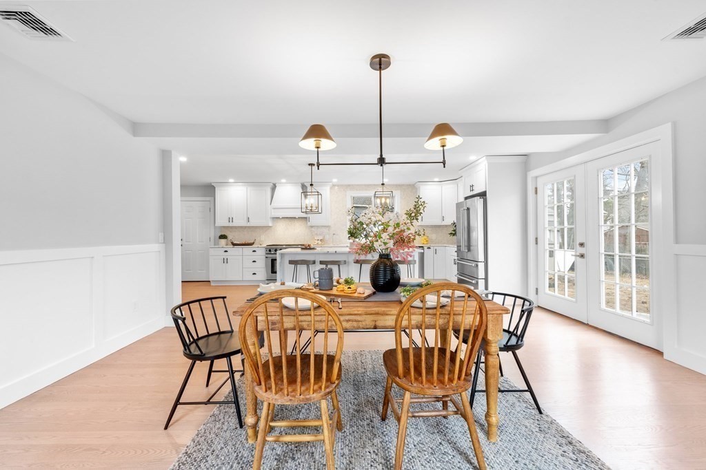 20 Mohawk Road Burlington, MA 01803 - Photo 5 of 39 a view of a dining room with furniture window and wooden floor