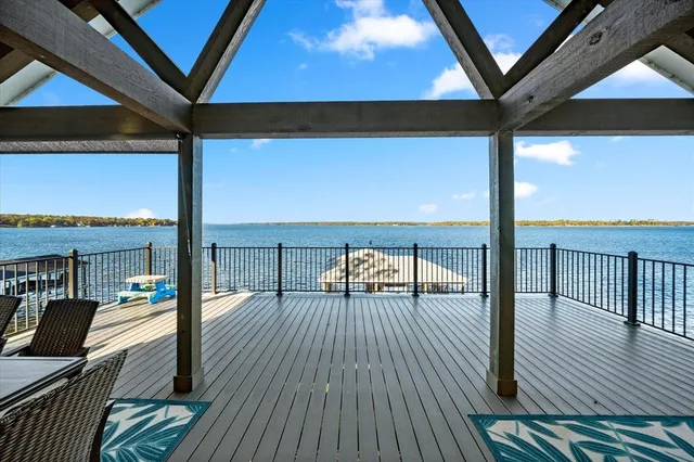 a balcony with wooden floor