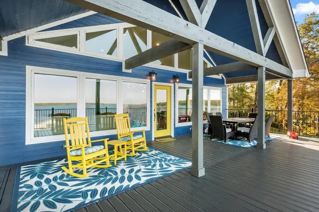 a view of living room with furniture and floor to ceiling window