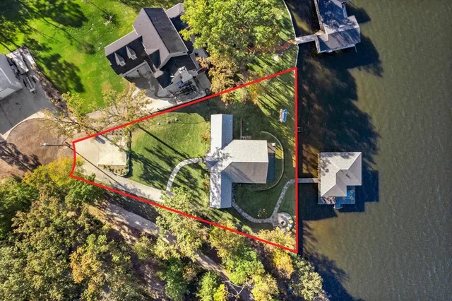 a ocean view with boat and palm trees