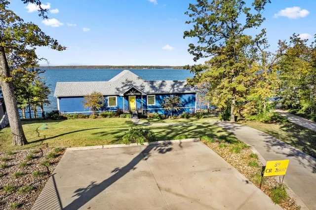 a view of houses with yard
