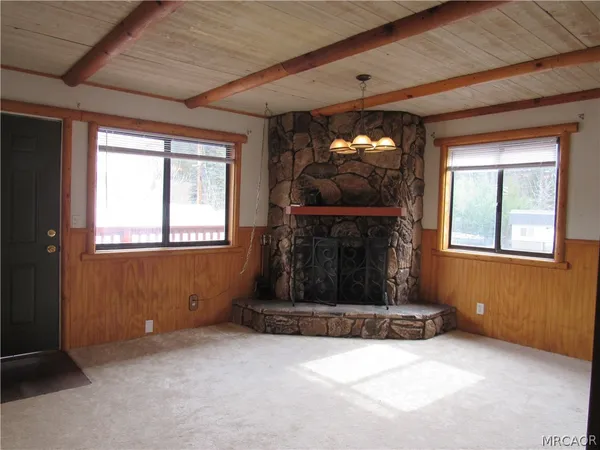 a living room with a fireplace