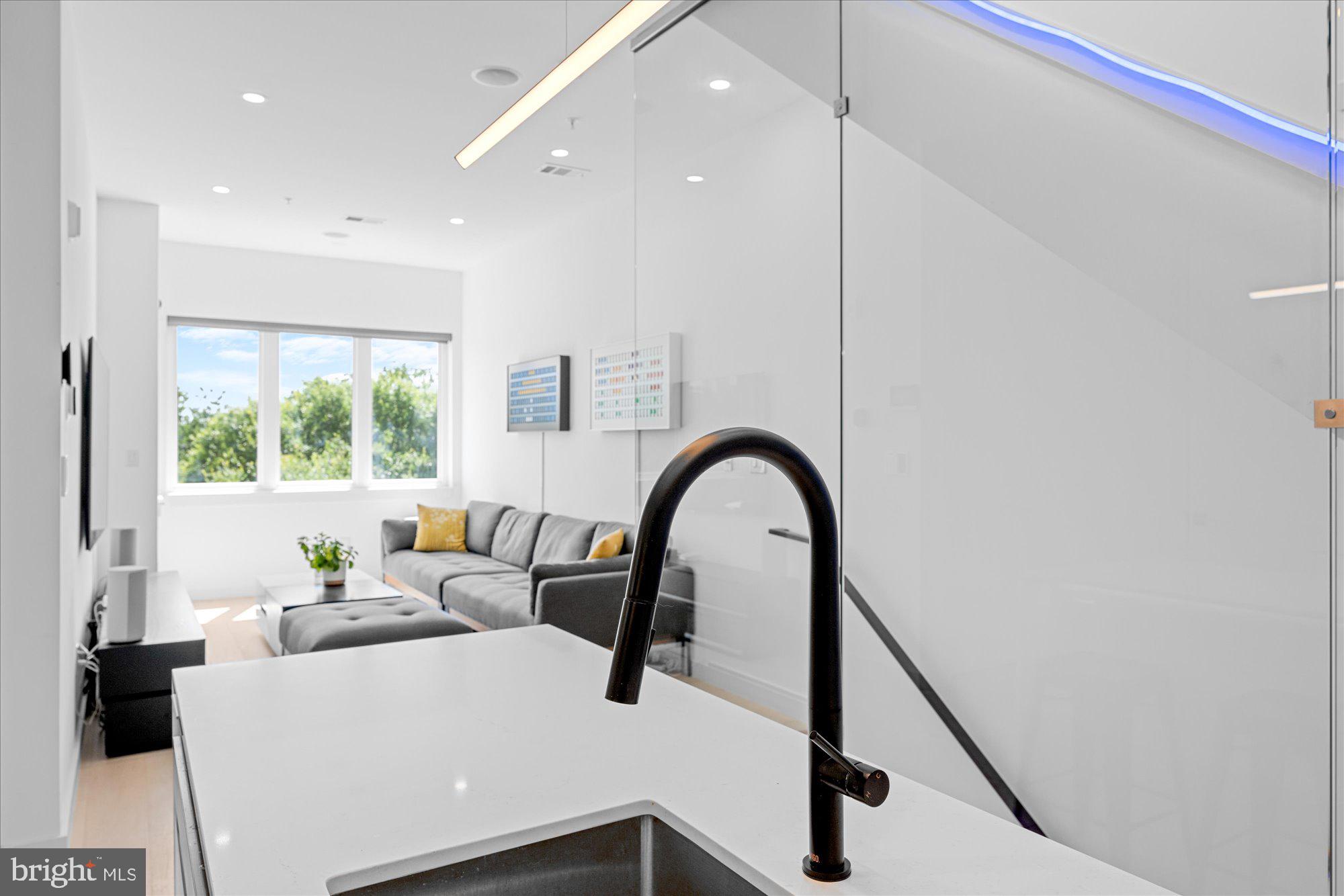 1715 North Capitol Street Northeast, Unit 7 Washington, DC 20002 - Photo 10 of 28 a living room with furniture