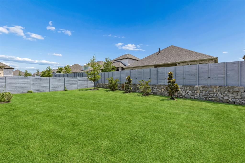 3004 Windy Rdg Road McKinney, TX 75071 - Photo 34 of 40 a view of a backyard