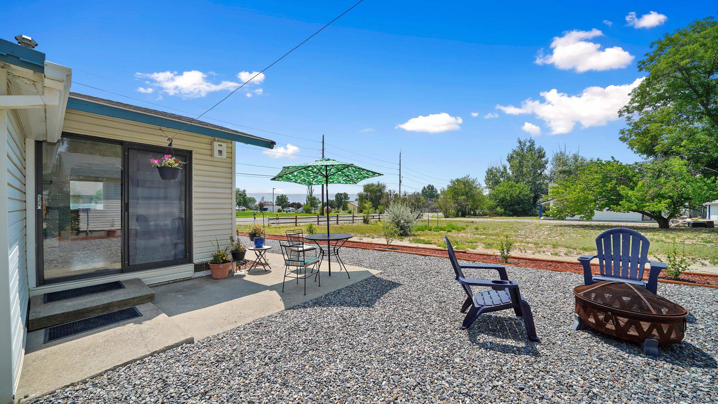 2396 H Road Grand Junction, CO 81505 - Photo 14 of 30 a view of a patio with a table and chairs