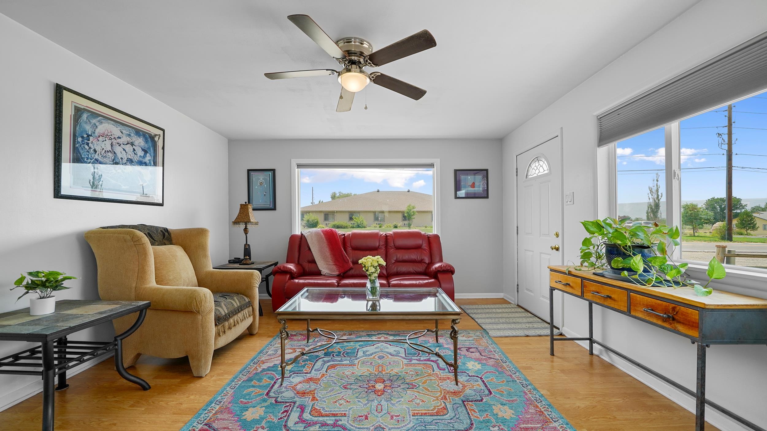 2396 H Road Grand Junction, CO 81505 - Photo 4 of 30 a living room with patio furniture and a potted plant