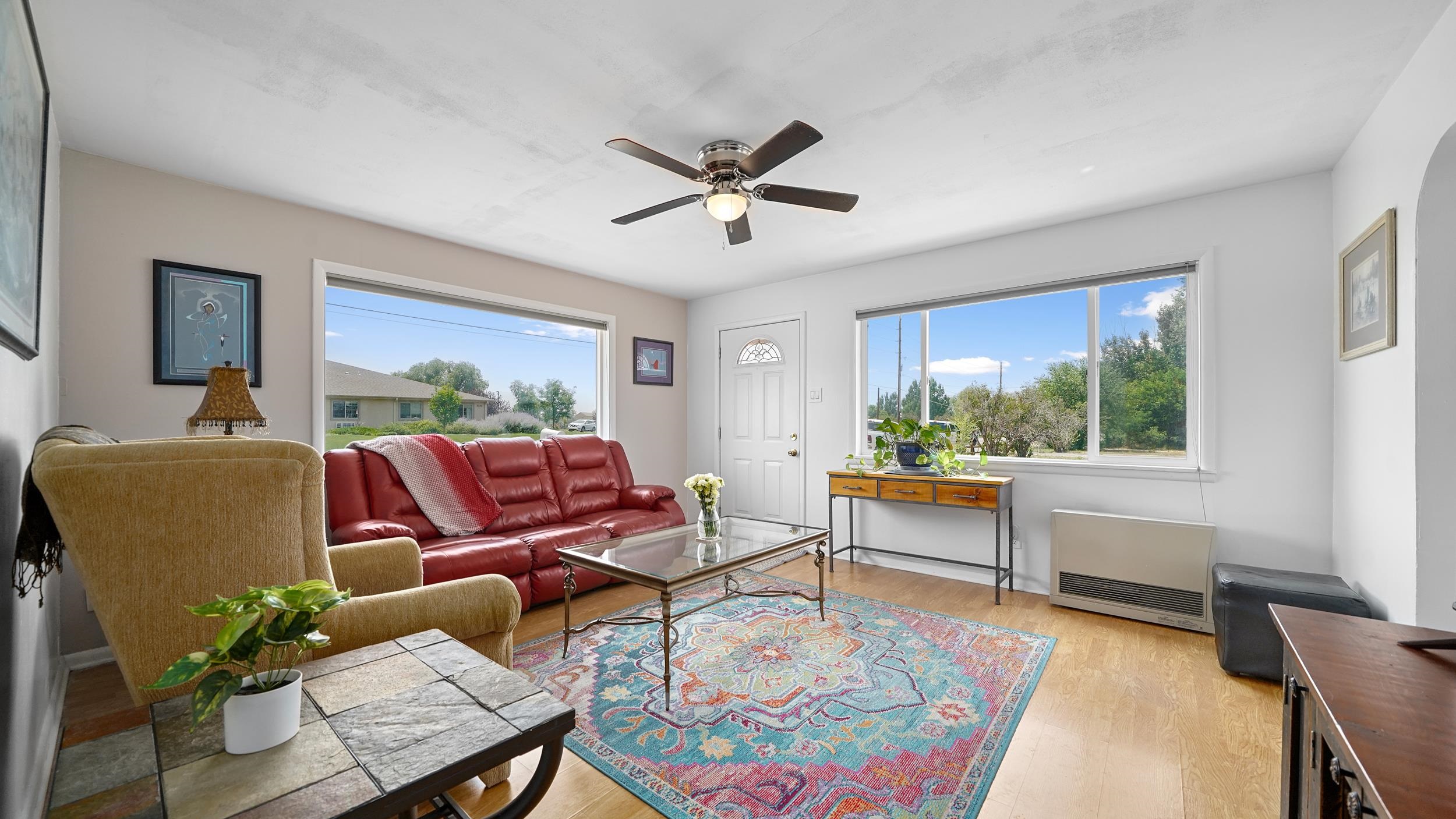 2396 H Road Grand Junction, CO 81505 - Photo 5 of 30 a living room with furniture and a large window
