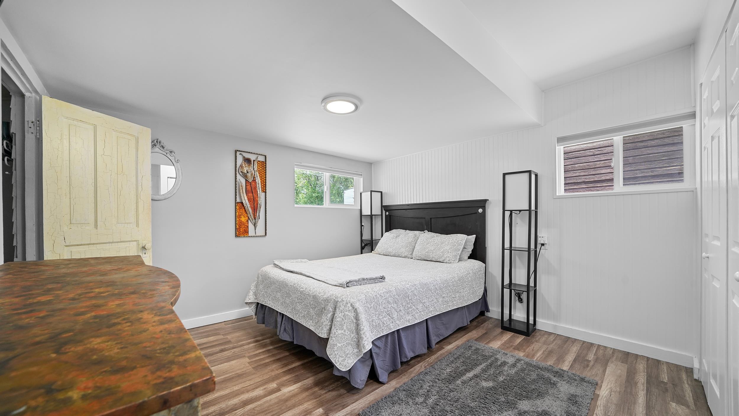 2396 H Road Grand Junction, CO 81505 - Photo 8 of 30 a bedroom with a bed and window