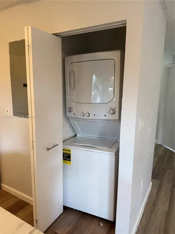 a utility room with washer and dryer