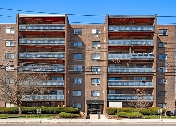 a front view of a building with a street