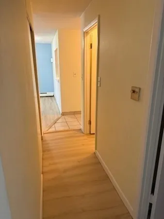 a view of hallway with shower