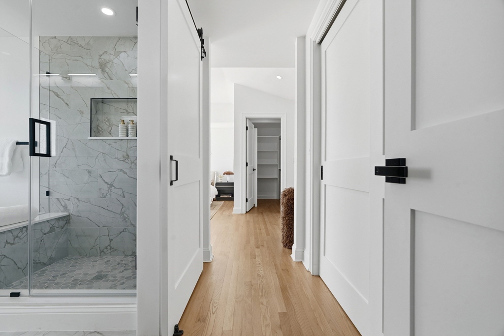 171 Shaw Road Brookline, MA 02467 - Photo 25 of 42 a view of a bathroom from the hallway