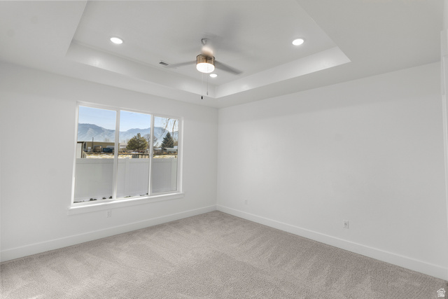 537 South Rivergate Drive Logan, UT 84321 - Photo 10 of 20 Bedroom featuring a tray ceiling with recessed lighting and a ceiling fan