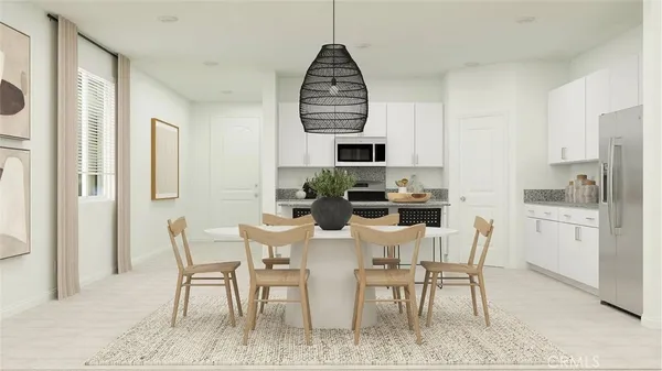 a view of a dining room with furniture