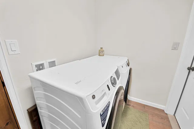 a utility room with dryer and washer