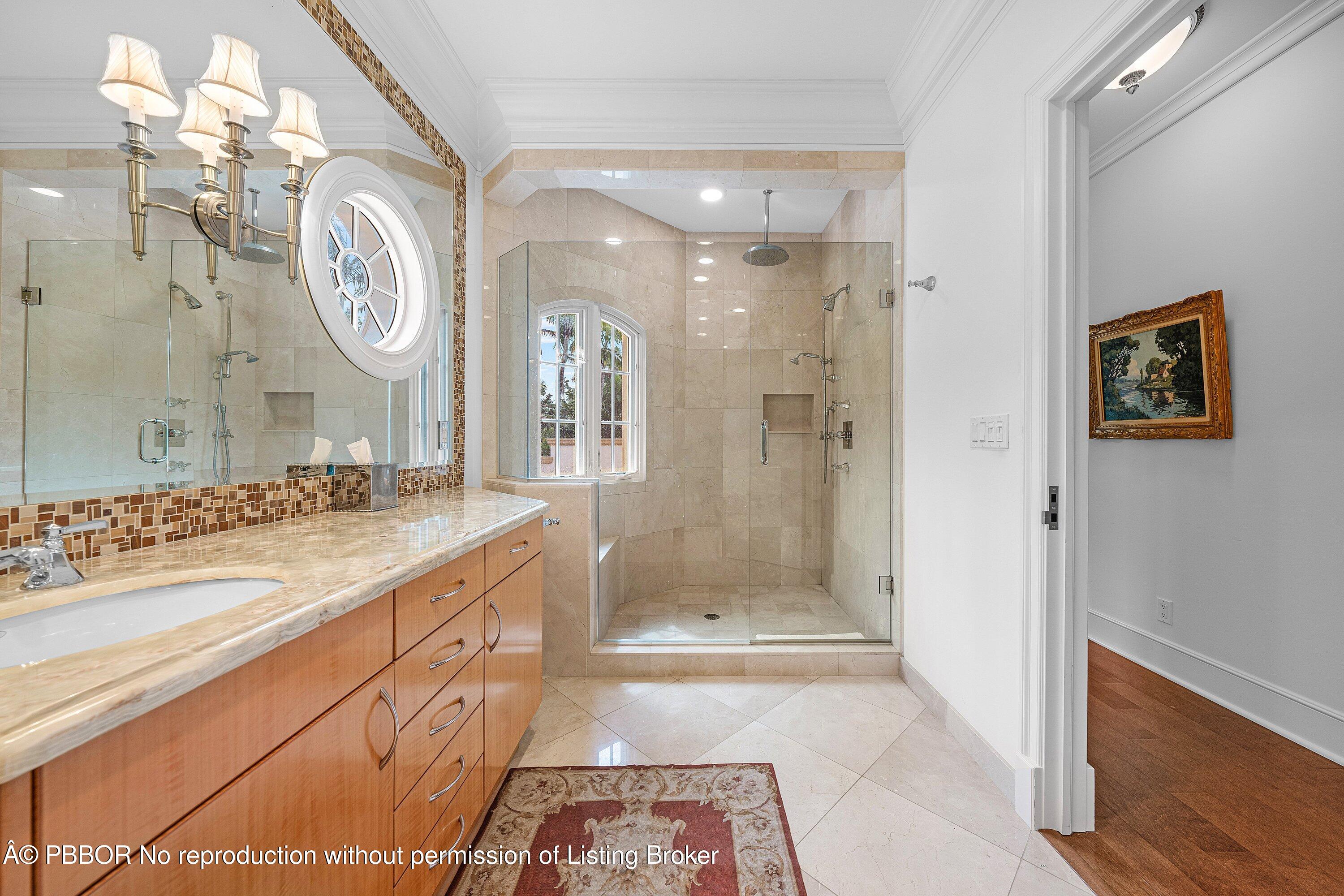 242 Wells Road Palm Beach, FL 33480 - Photo 22 of 54 a bathroom with a double vanity sink mirror and shower
