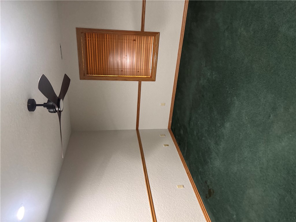 15262 Shipe Road Gravette, AR 72736 - Photo 9 of 60 Recessed ceiling lighting, ceiling fan with integrated light, wood trim, and wall-mounted electrical outlets