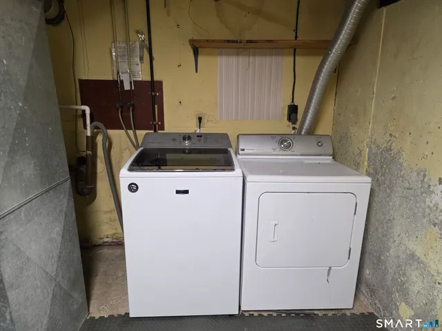 a utility room with dryer and washer
