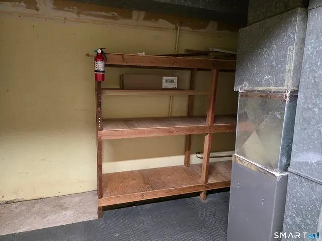 a room with storage and utility