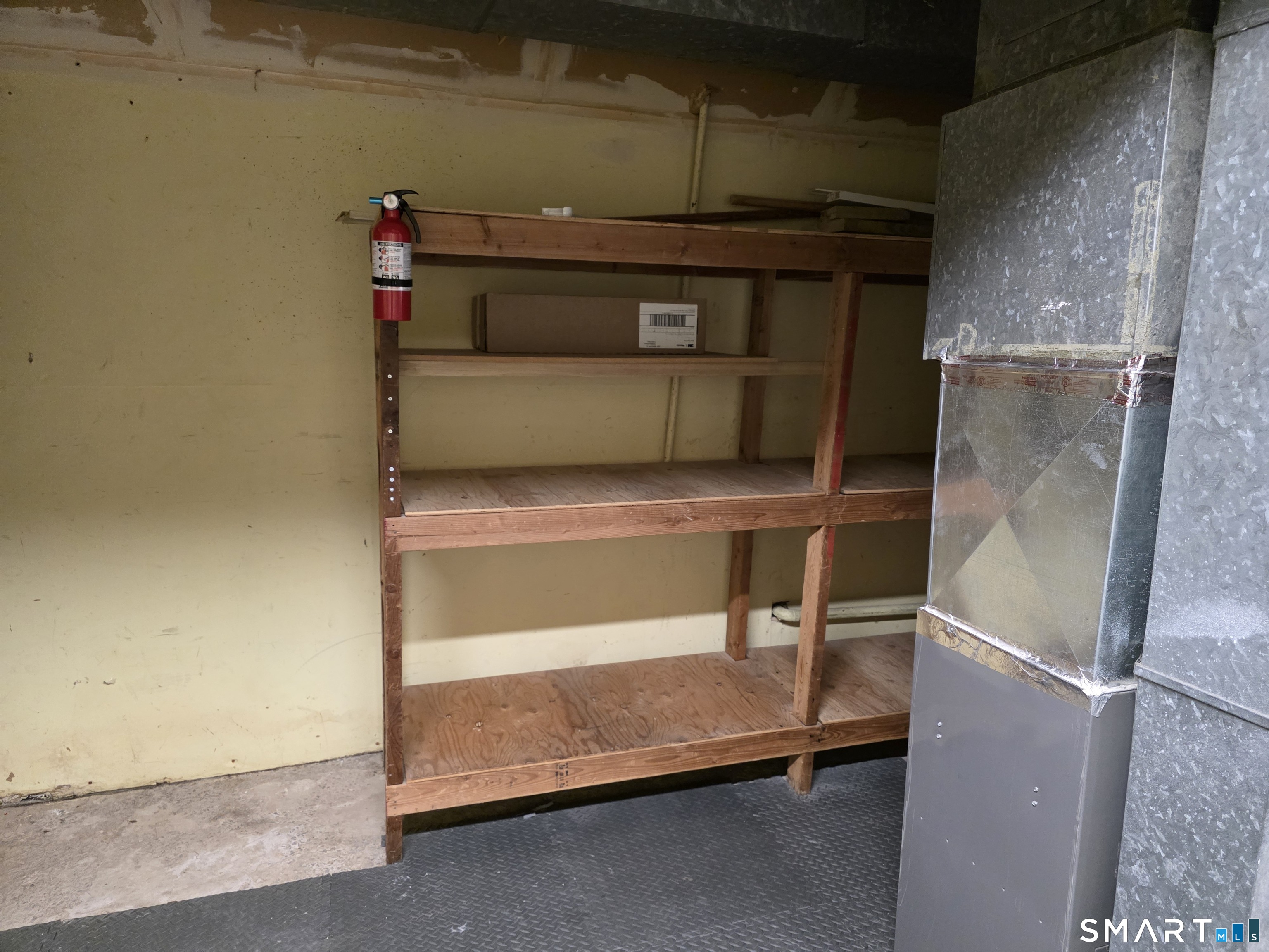 45 Towne House Road, Unit 45 Hamden, CT 06514 - Photo 14 of 23 a room with storage and utility