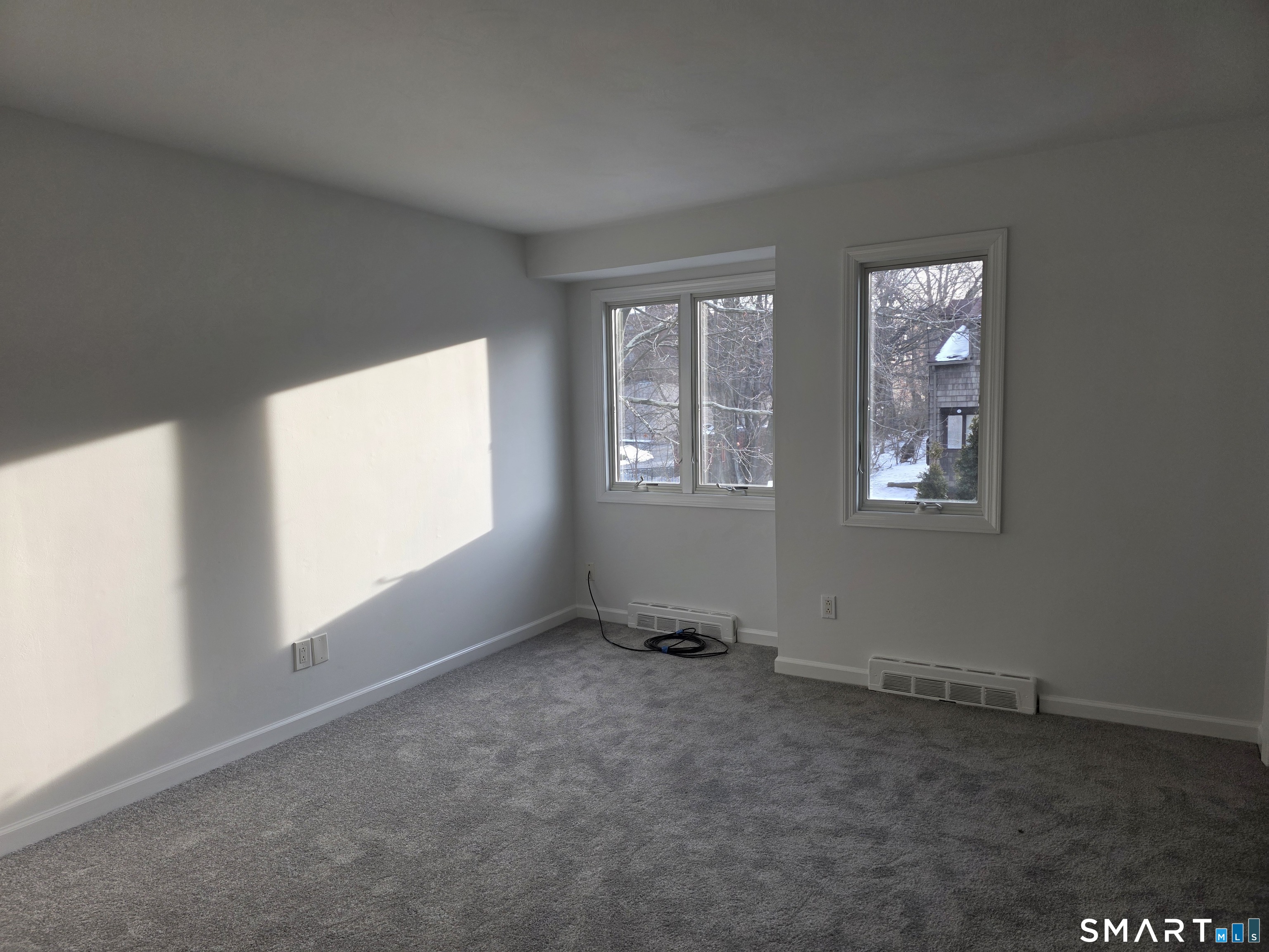 45 Towne House Road, Unit 45 Hamden, CT 06514 - Photo 20 of 23 an empty room with windows