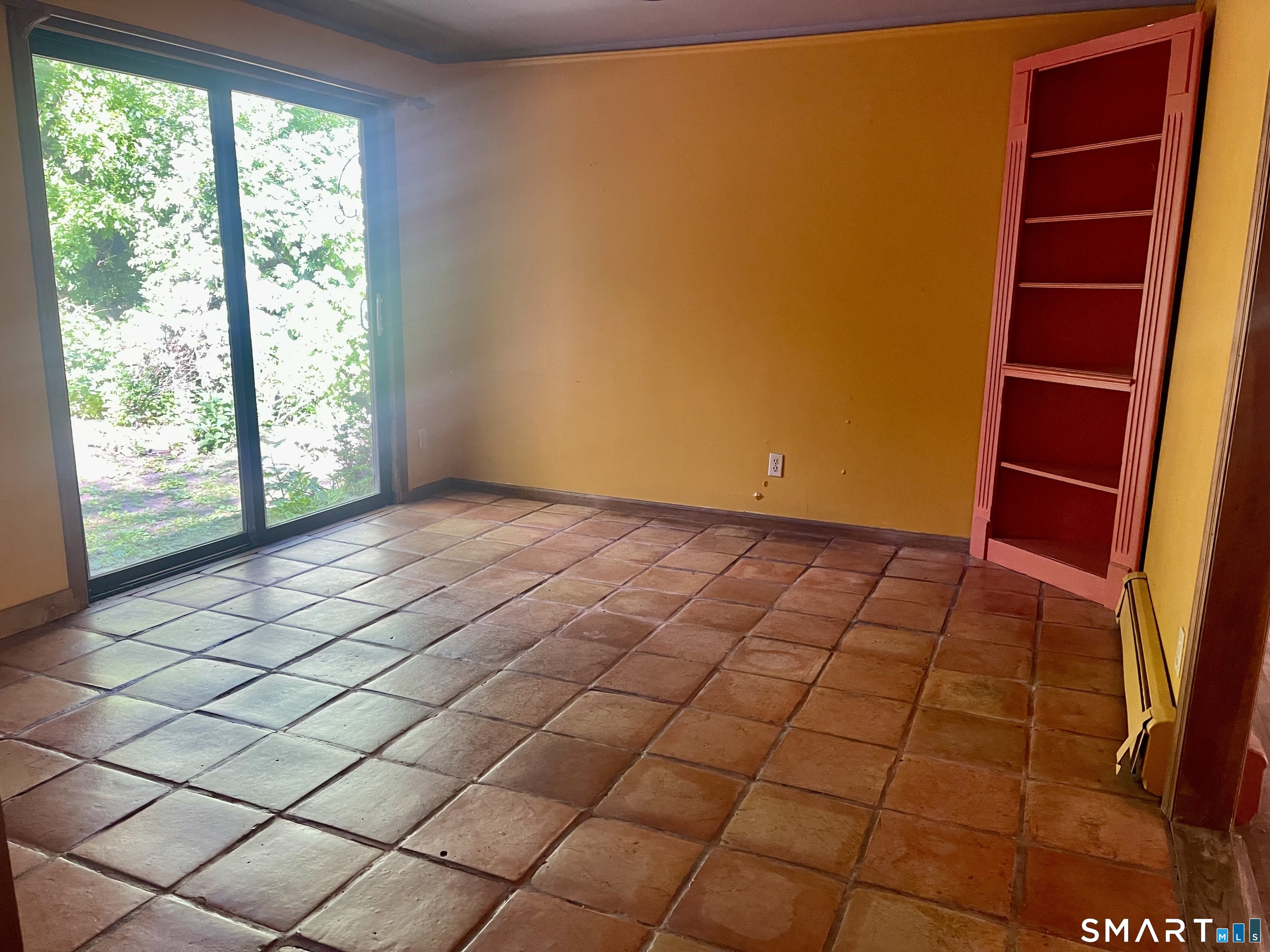 11 Tubbs Spring Drive Weston, CT 06883 - Photo 14 of 36 The dining room has tile floor, a corner cabinet and slider