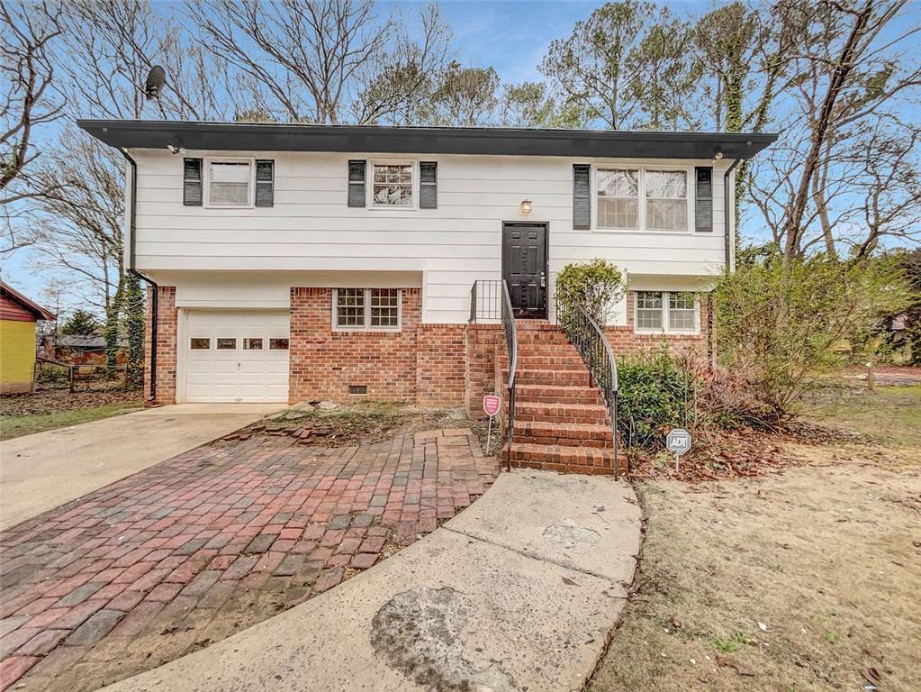 1588 Pintail Road Hampton, GA 30228 - Photo 1 of 1 a front view of a house with a yard