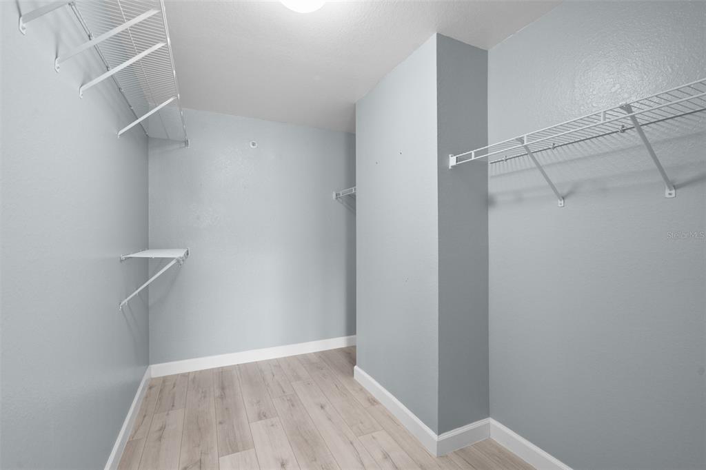 5459 Vineland Road, Unit 4302 Orlando, FL 32811 - Photo 15 of 25 a view of an empty walk in closet