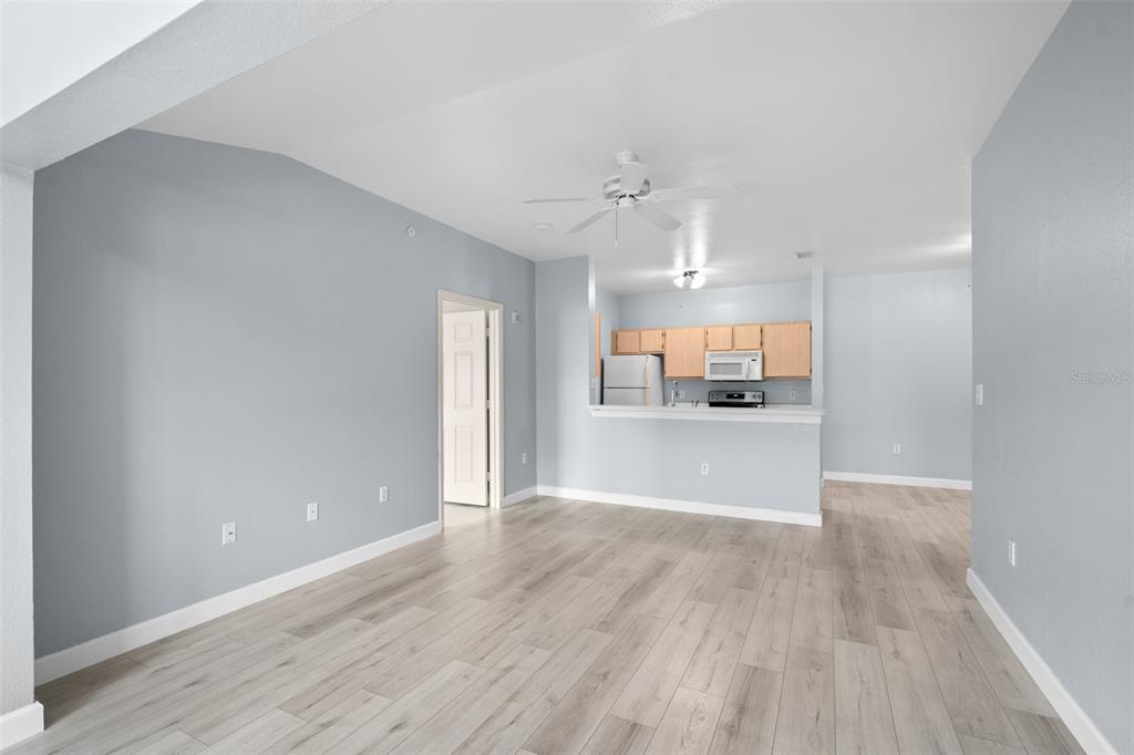 5459 Vineland Road, Unit 4302 Orlando, FL 32811 - Photo 7 of 25 a view of kitchen and window