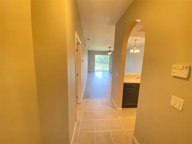 a large bathroom with a sink a large mirror and a shower