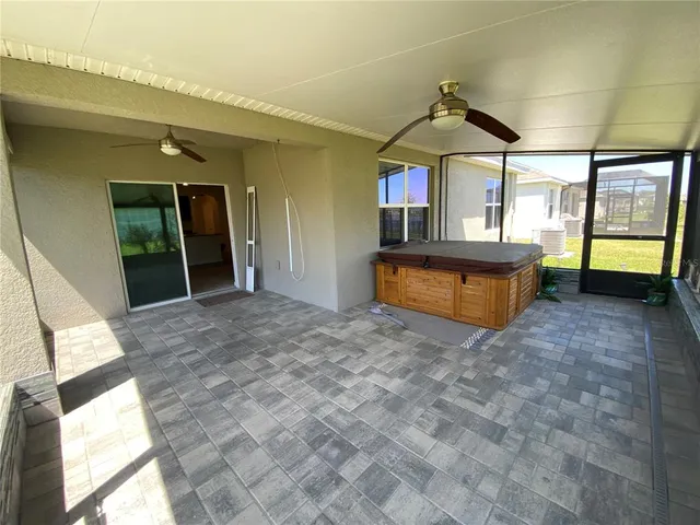 a view of front door with outdoor seating