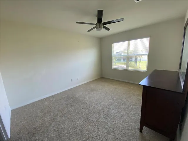 a view of a room with a window