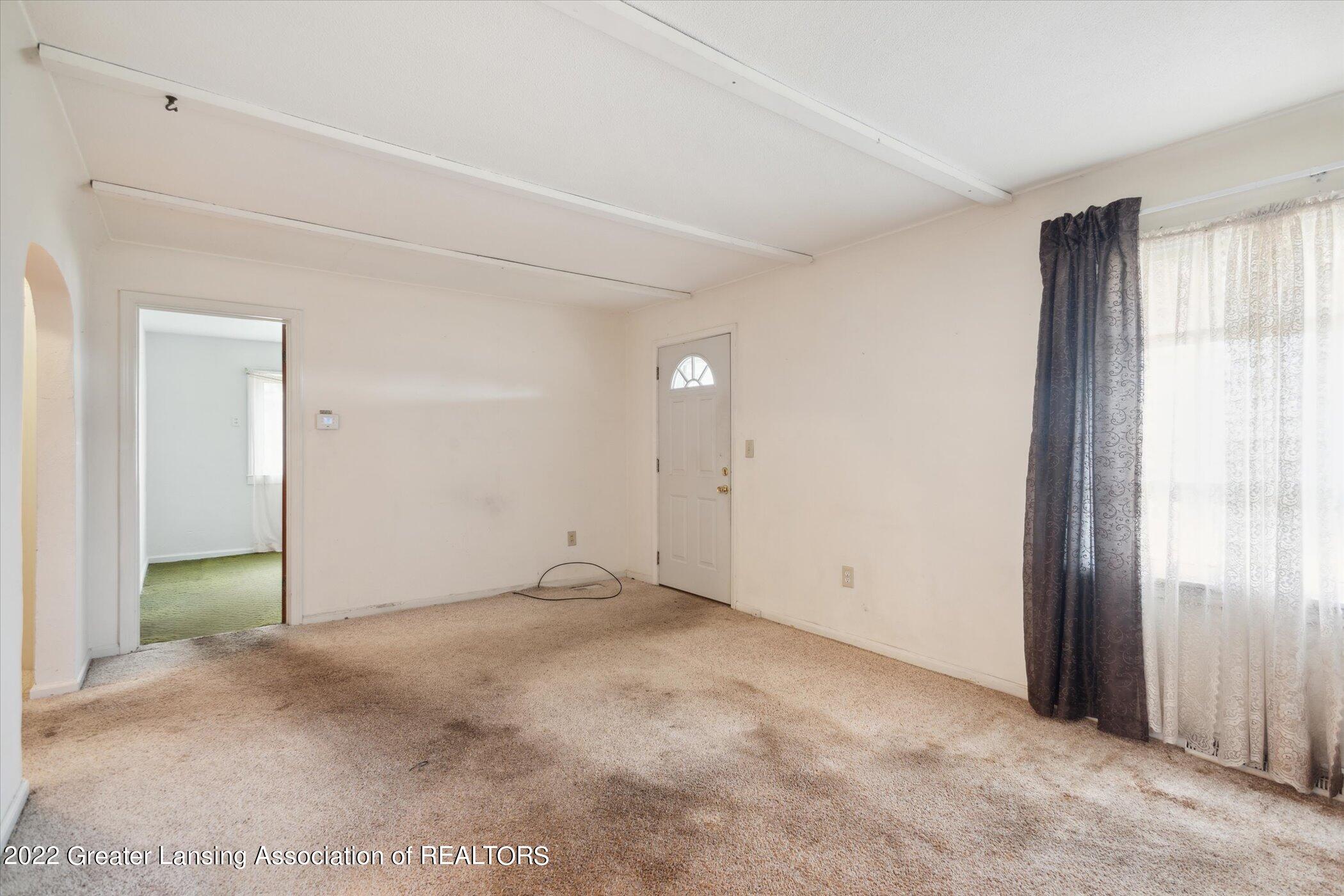 5897 Lansing Road Potterville, MI 48876 - Photo 20 of 34 06-5897-Lansing-Rd-WindowStill-04