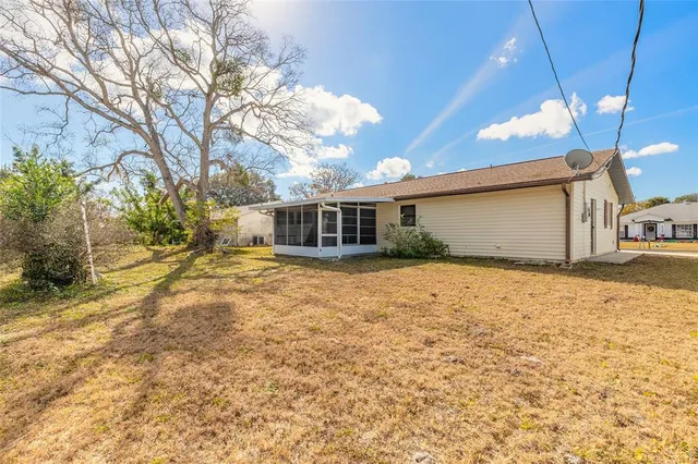 a house view with a swimming pool
