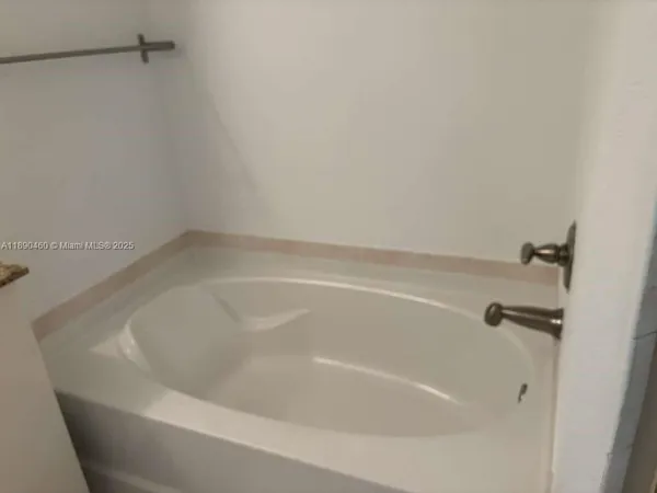 a close view of a bathtub in bathroom