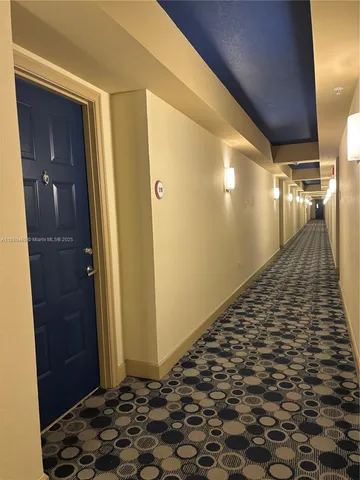 a view of swimming pool from a balcony