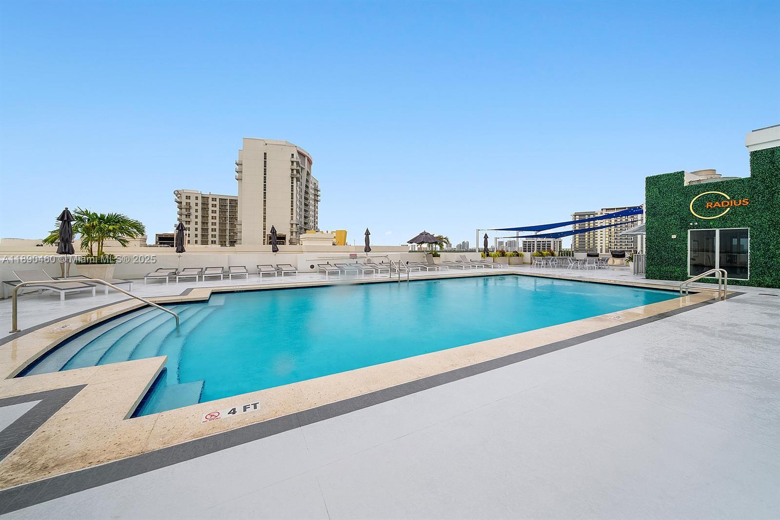 1830 Radius Drive, Unit 318 Hollywood, FL 33020 - Photo 27 of 47 a view of swimming pool from a balcony