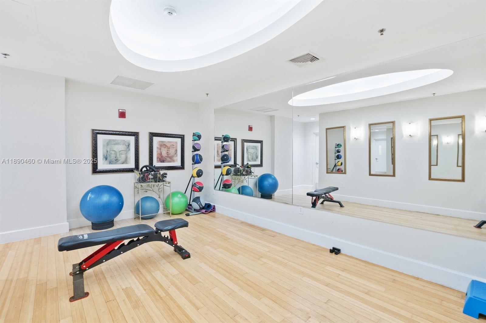 1830 Radius Drive, Unit 318 Hollywood, FL 33020 - Photo 35 of 47 a view of a room with gym equipment