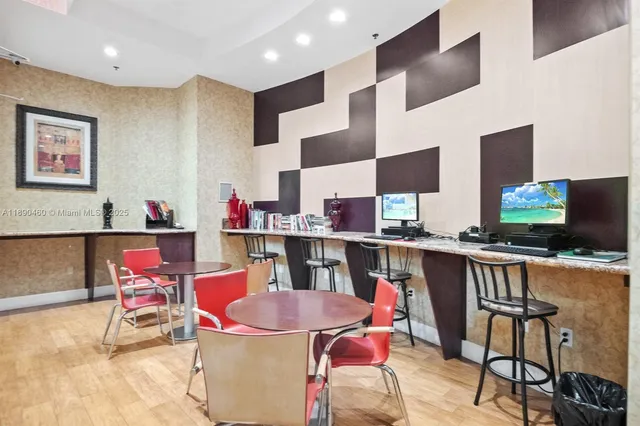 a room with furniture and wooden floor