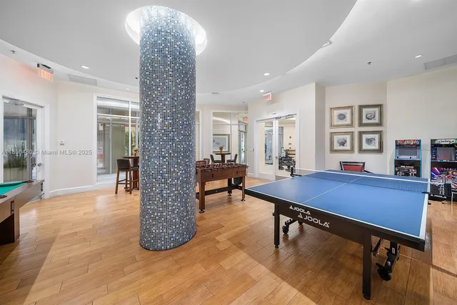 a room with lots of wooden furniture table and chairs