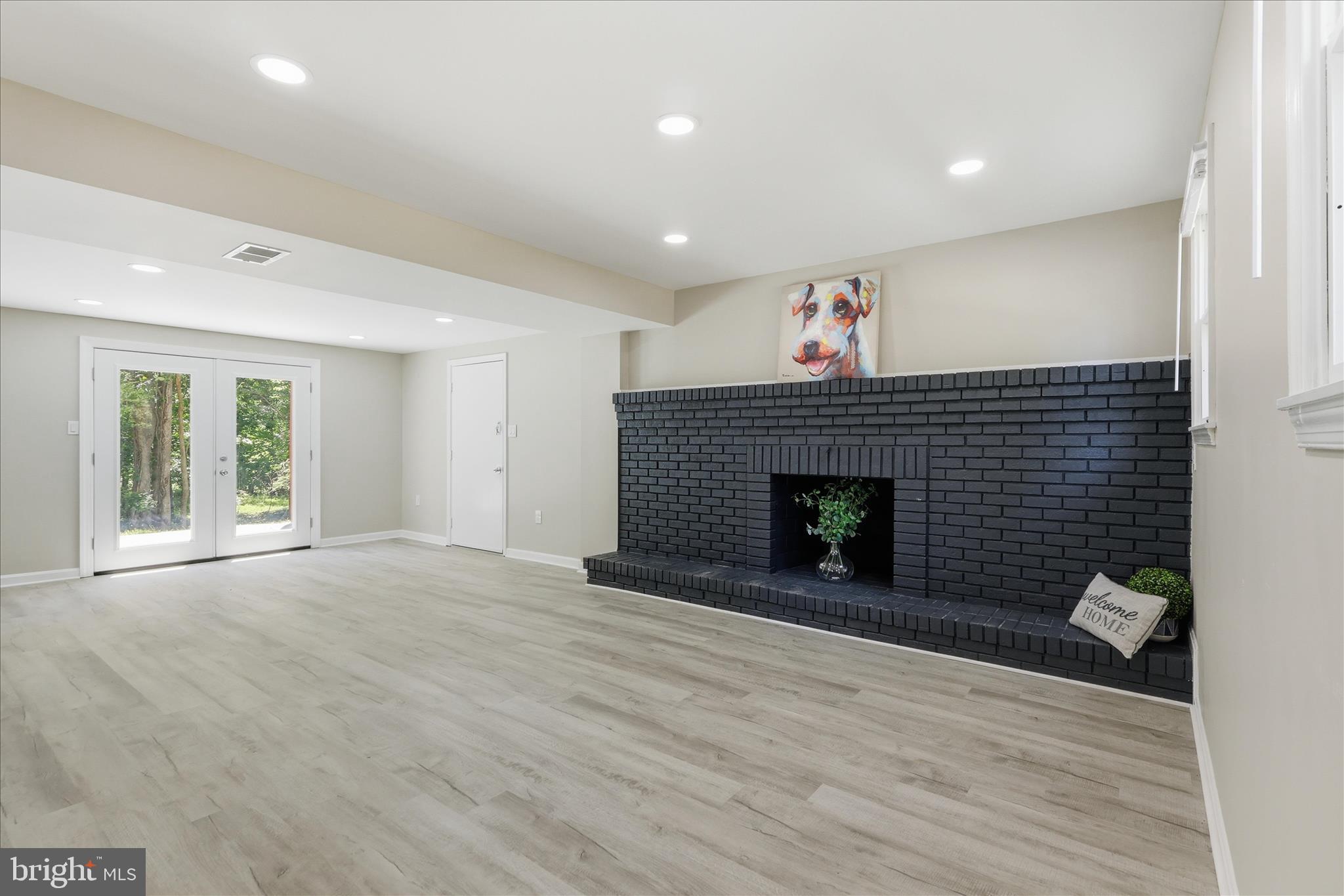 8855 Lowell Road Pomfret, MD 20675 - Photo 25 of 48 Lower level main living area in law suite